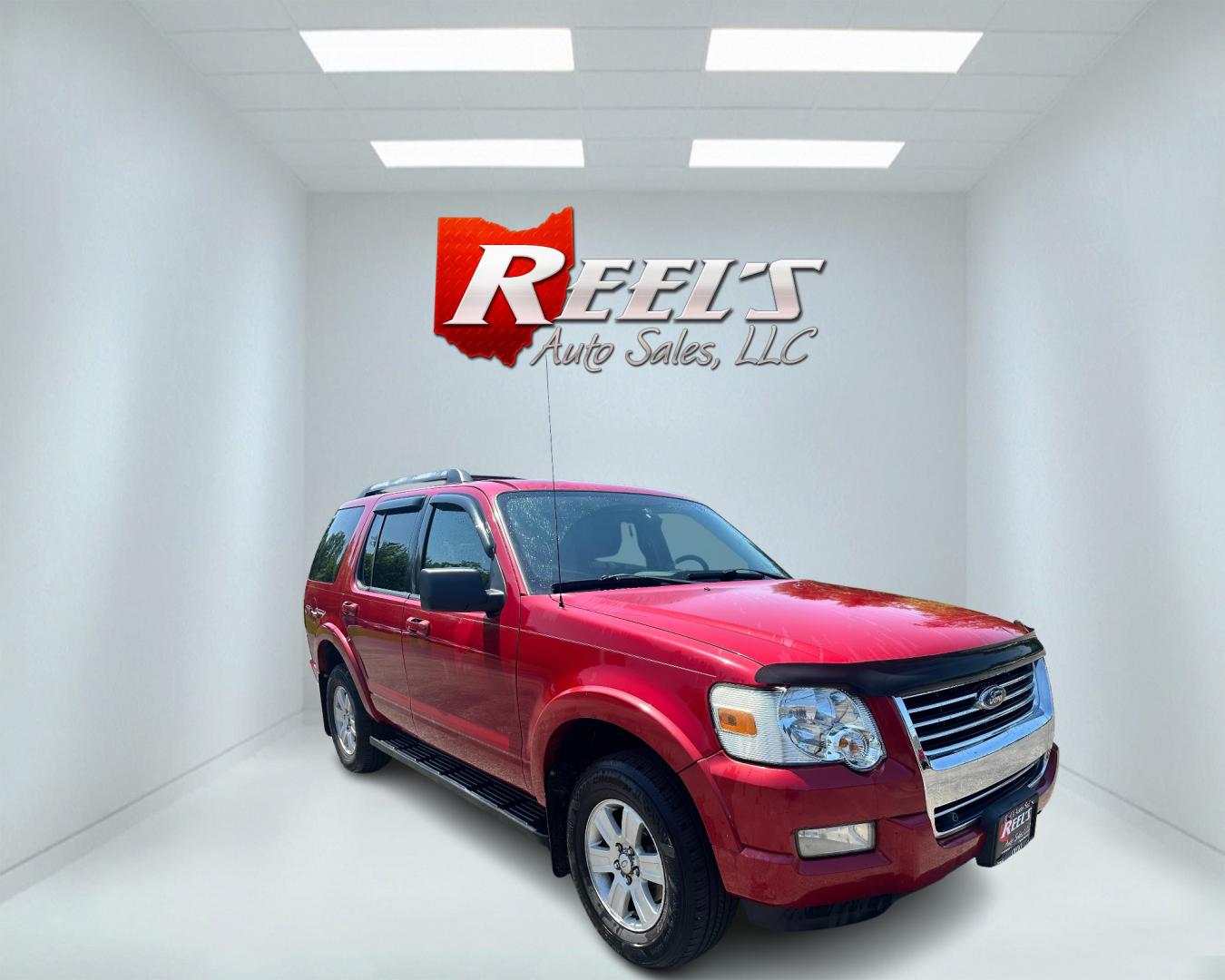 2009 Red /black Ford Explorer XLT (1FMEU73E89U) with an 4.0L V6 engine, 5-Speed Automatic transmission, located at 11115 Chardon Rd. , Chardon, OH, 44024, (440) 214-9705, 41.580246, -81.241943 - This 2009 Ford Explorer is a reliable and capable SUV, offering a 4.0L V6 engine paired with a 5-speed automatic transmission and full-time 4WD system. With a 3,500-pound towing capacity, it's suitable for moderate hauling needs. Additionally, the power driver's seat provides comfort and convenience - Photo#2